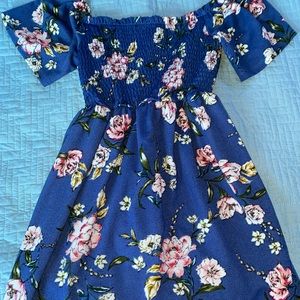 blue dress with flowers all over (looks shorted in picture)